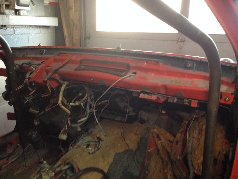 29218793824_55b1fb27bd_c Interior dashboard area of an old vehicle with exposed wiring and missing components
