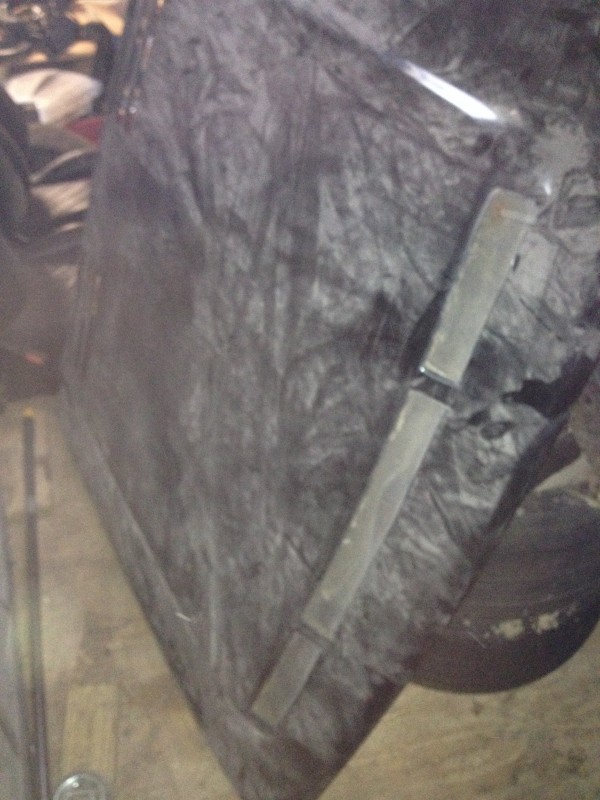 29640251396_139fdb8428_c Black textured board with two symmetrical straps attached in a vertical pattern