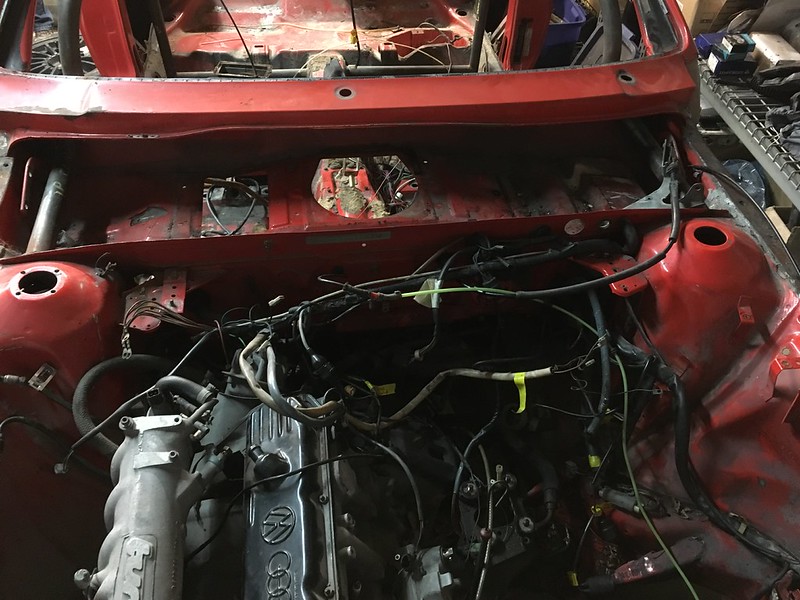 30542730421_e059727f55_c Empty red car engine bay with exposed engine and disconnected wiring harnesses