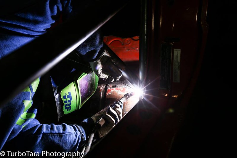 31286954674_799dcce14d_c Person welding metal inside a UR Quattro with protective gloves and helmet