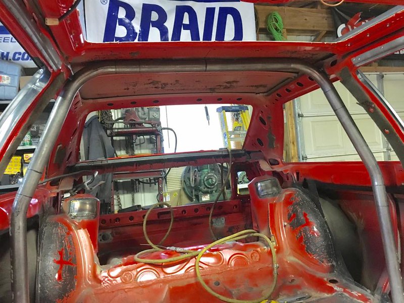 31714908076_53b3017ee2_c Interior of a UR Quattro stripped down with a metal roll cage installed and tools visible in a workshop