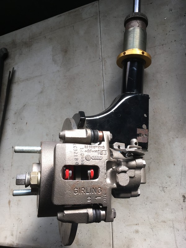 31984429604_fe35aec7d0_c UR Quattro brake caliper assembly with visible red brake pads mounted on a metal surface