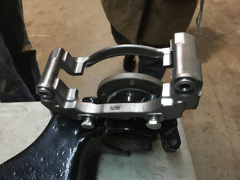 33448544325_57c587d7cd_c Metal brake caliper mounted on a black automotive suspension component Group B UR Quattro