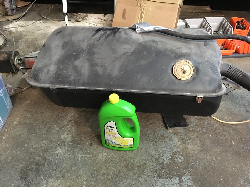 34176414945_1d892d282f_c UR Quattro fuel tank with a round fuel cap on a workshop floor, a green detergent container labeled 'dishwasher salt' in front