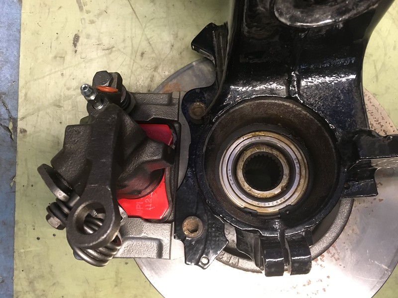 34434704176_c8aa54c534_c Close-up of a disassembled UR Quattro brake caliper showing the brake pads and bearing